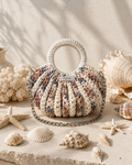 Solea Éternelle Bag 
Η πολυτέλεια της θάλασσας, πλεγμένη στο χέρι.